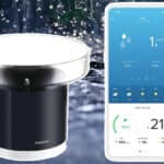 A smart weather sensor and a smartphone displaying a weather app interface with data readings.