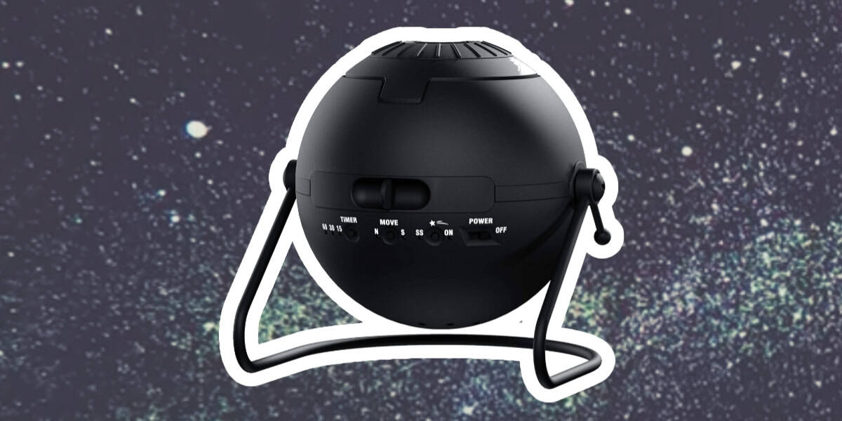 A black spherical star projector with control buttons sits against a starry background.