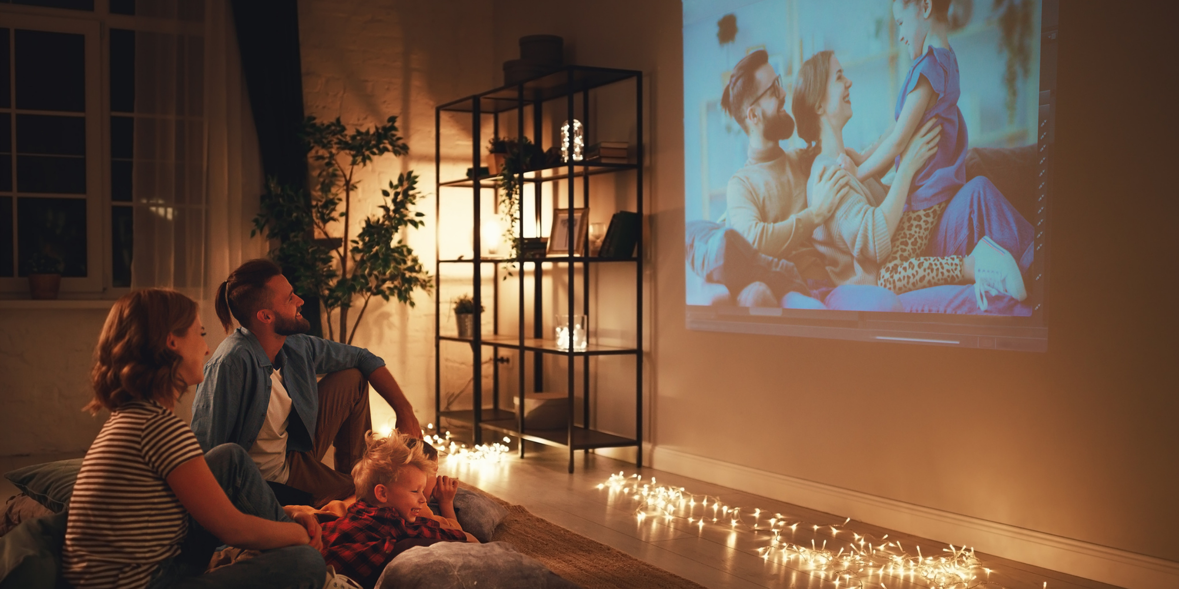 Family using home projector