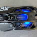 A black mouse with blue lights on it.