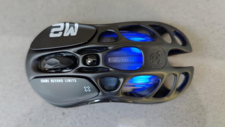 A black mouse with blue lights on it.