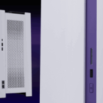 A white desktop computer case with perforated side panels is shown; a close-up reveals USB ports, a power button, and a slim vertical slot on a purple accent strip.