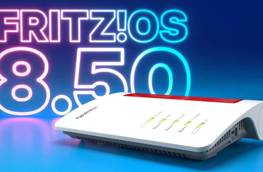 A white FRITZ!Box router on a blue surface with “FRITZ!OS 8.50” in large neon letters behind it.